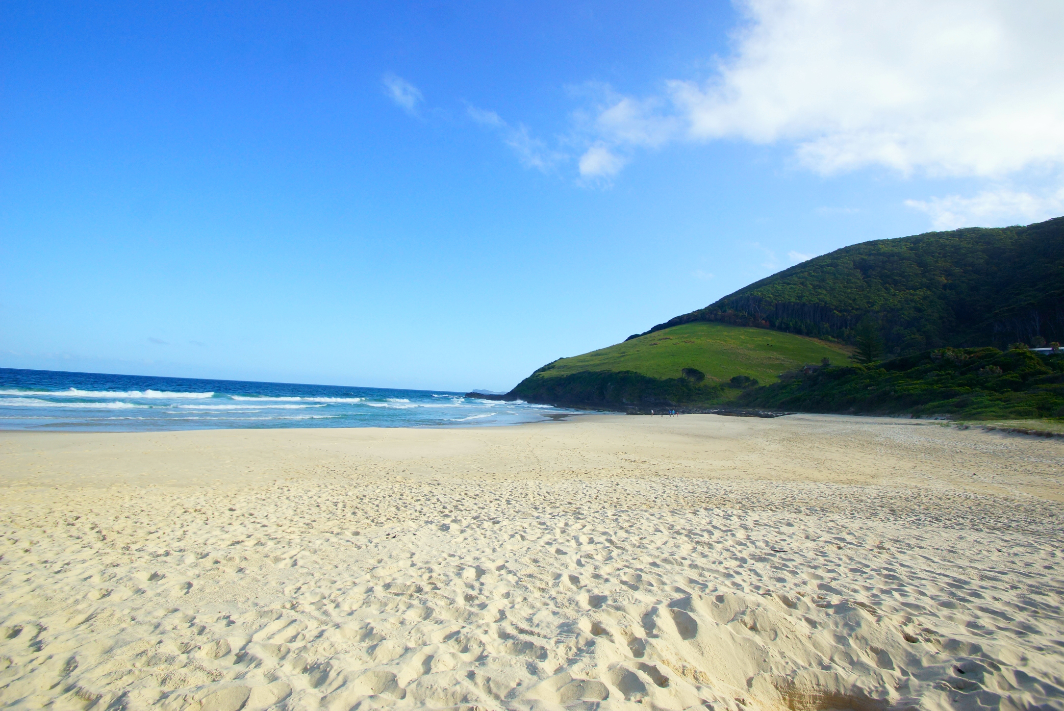 Blueys Beach coastline with turquoise water and white sand