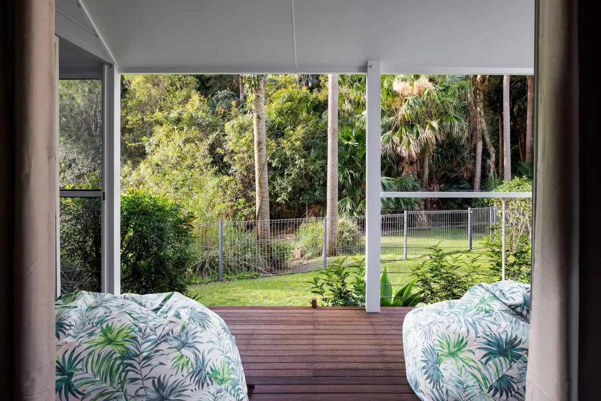Covered veranda with a peaceful garden outlook at Blueys Retreat