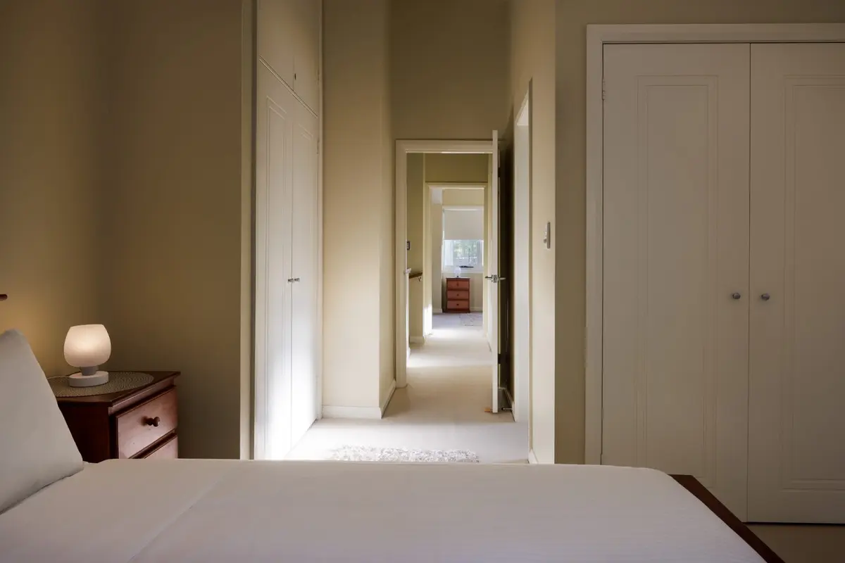 Main bedroom and hallway in a Two Bedroom Townhouse at Blueys Retreat