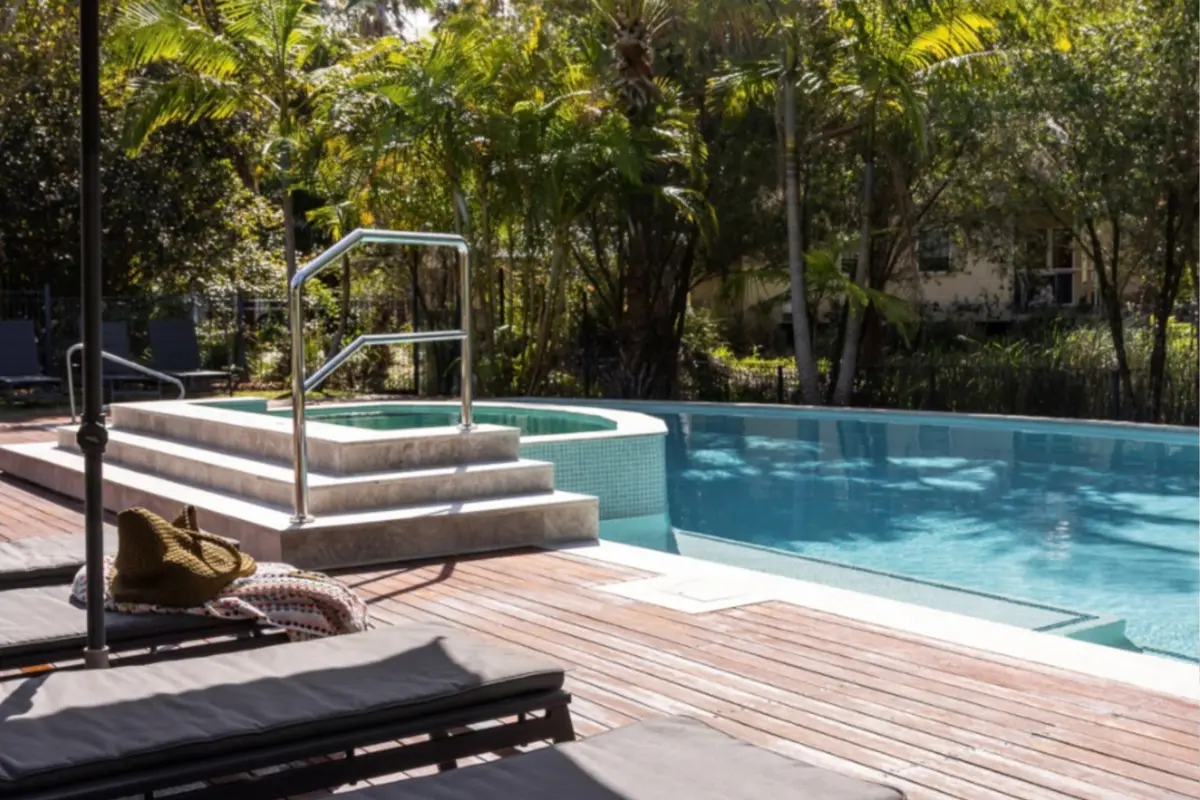Swimming pool and poolside area at Blueys Retreat